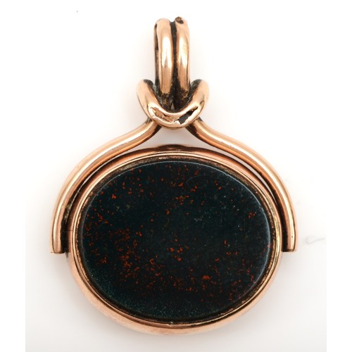 182 - A 10ct rose gold swivel seal, set with bloodstone and carnelian, 28 x 24mm, twist mount, 13.6gm