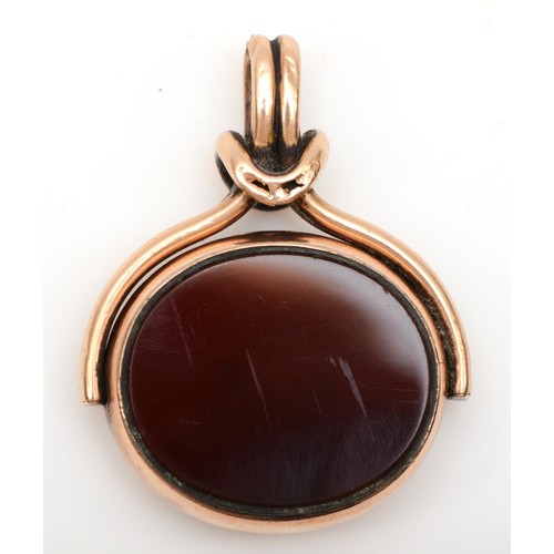 182 - A 10ct rose gold swivel seal, set with bloodstone and carnelian, 28 x 24mm, twist mount, 13.6gm