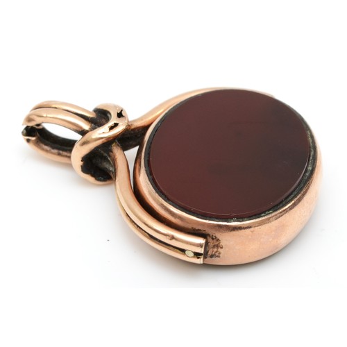 182 - A 10ct rose gold swivel seal, set with bloodstone and carnelian, 28 x 24mm, twist mount, 13.6gm