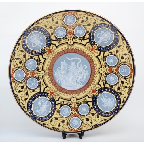 283A - A 19th century, Ludwigsburg porcelain charger with central roundels of Pate sur Pat style decoration... 