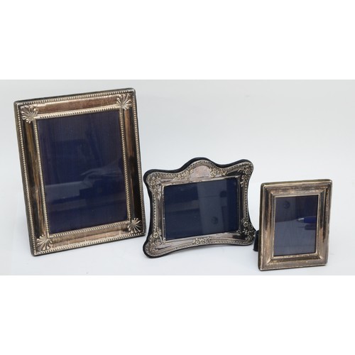 9 - A silver photograph frame, Sheffield 1994, 22 x 17.5cm, and two others, Sheffield 1993 and London 19... 