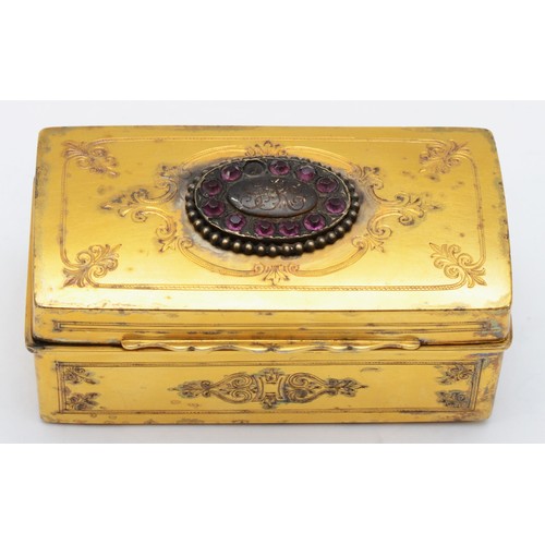 An early 19th century Dutch silver gilt box, The Hague, 1908, 0.833 standard, the hinged cover with inset amethyst glass (one vacant), the underside with presentation inscription,9 x 4.5 x 4cm, 132gm