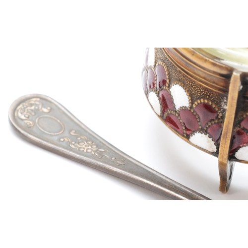 45 - A Russian gilt metal and enamel open salt, post Revolution, with spoon, diameter 4.5cm