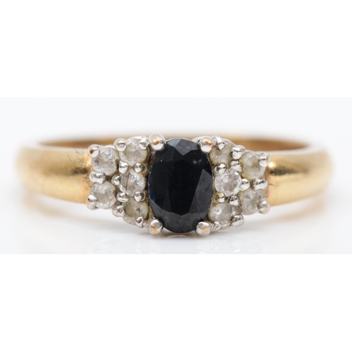 387 - A 9ct gold sapphire and CZ dress ring, P, 3.4gm.