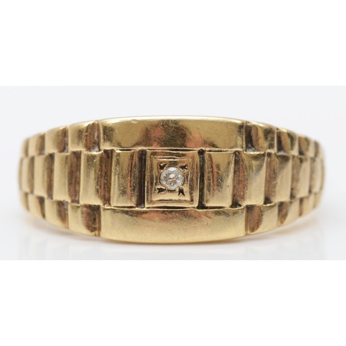 388 - A 9ct gold Rolex style and brilliant cut diamond signet ring, T, 3.7gm