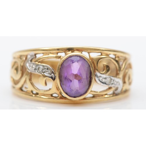 389 - A 9K gold, amethyst and and diamond openwork dress ring, P, 3.1gm