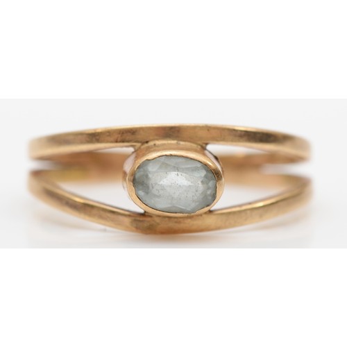 398 - An unmarked 9ct rose gold and aquamarine ring, P, 2.5gm