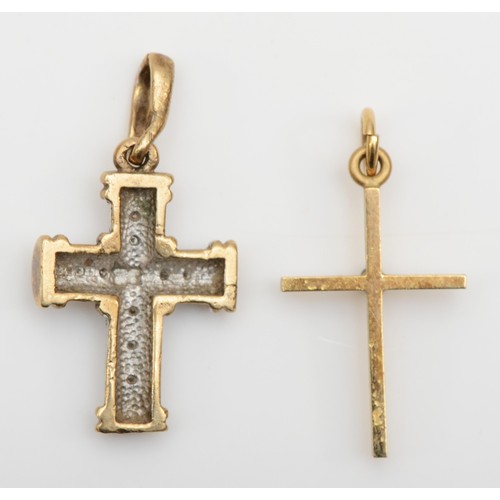 409 - A 9ct gold and diamond cross pendant and another with a single diamond, 3m