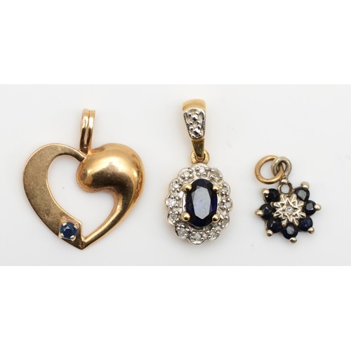 410 - A sapphire and diamond cluster pendant and two other sapphire pendants, 3.2gm