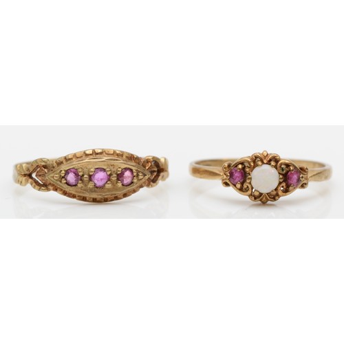 416 - A 9ct gold opal and ruby ring, M, and an Edwardian style three stone ruby ring, Q, 2.7gm