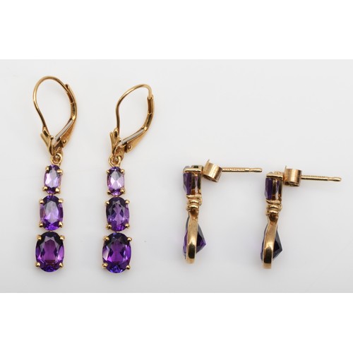 417 - A 9ct gold and amethyst drop ear pendants, 20mm and another pair of amethyst ear rings, 4.1gm