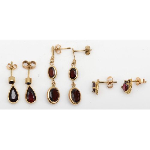 418 - Three pairs of 9ct gold mounted garnet ear rings, 3.8gm