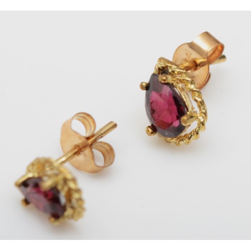 418 - Three pairs of 9ct gold mounted garnet ear rings, 3.8gm