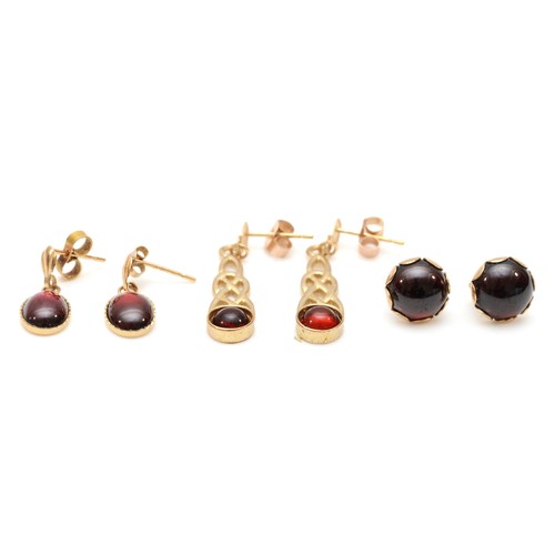 419 - Three pairs of 9ct gold mounted garnet ear rings, 4.5gm