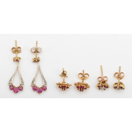 422 - Two pairs of 9ct gold, ruby and diamond ear rings and a ruby pair, 4.2gm