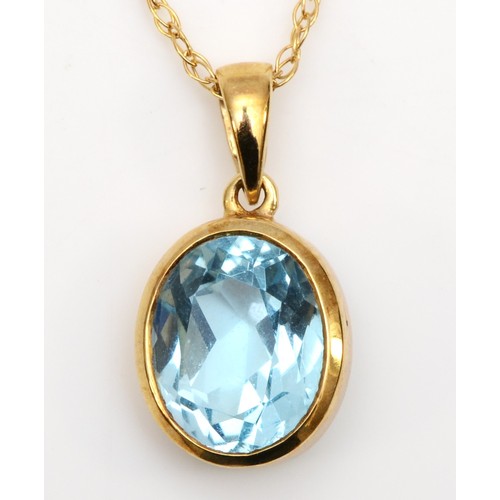 425 - A 9ct gold mounted topaz pendant, stone 11 x 9mm, chain 46cm, 2.4gm