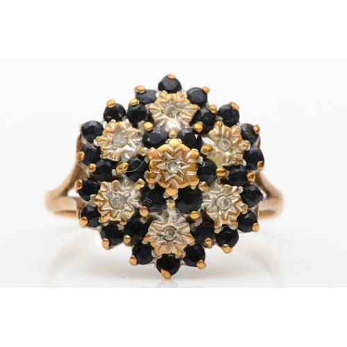 434 - A 9ct gold sapphire and diamond large cluster ring, S, 4.1gm