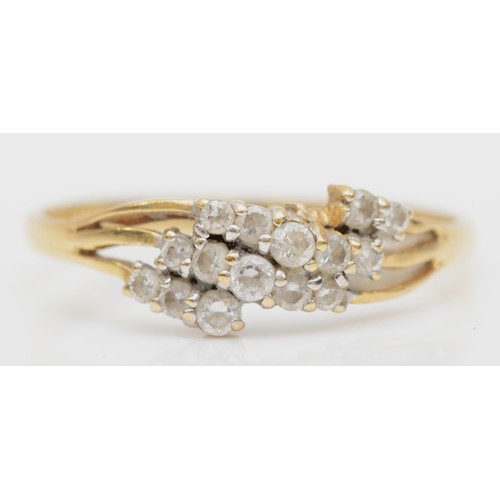 436 - A 14K gold and CZ dress ring, R, 1.9gm