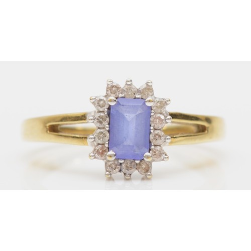 438 - A 9ct gold, tanzanite and brilliant cut diamond cluster ring, N, 3.2gm