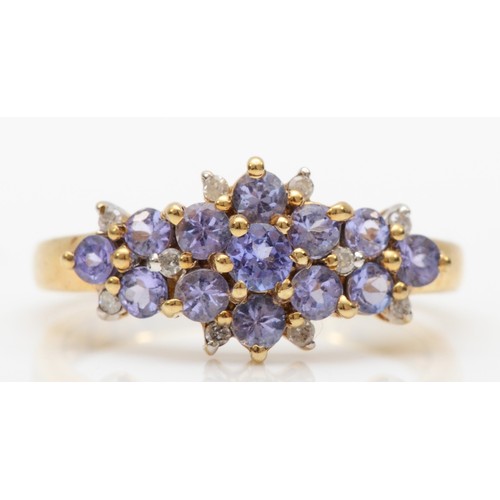 440 - A 9ct gold tanzanite and diamond cluster ring, N, 2.5gm