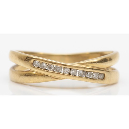 446 - A 9ct gold and brilliant cut diamond ring, stated weight 0.10cts N, 2.1gm