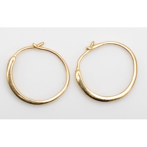 447 - A 9ct gold pair of brilliant cut diamond hoop ear rings, 1.6gm