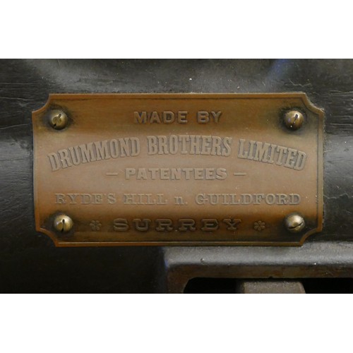 A Drummond Brothers Limited vintage electric lathe on metal stand