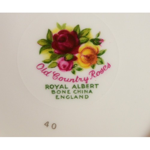 211 - Four boxes of assorted Royal Albert bone china dinnerwares  to include Old Country Roses, Sweet Pea ... 