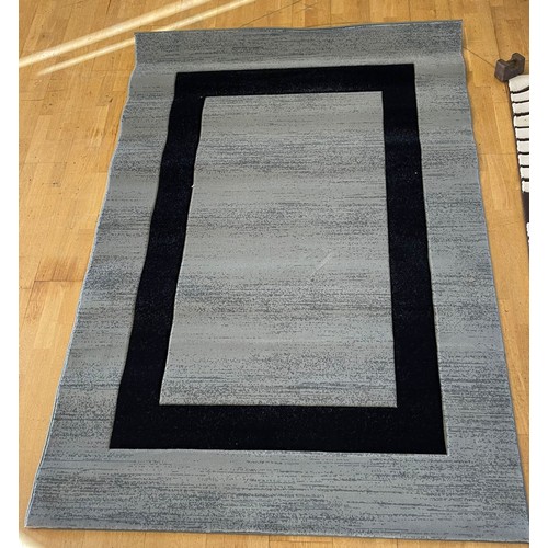 A contemporary brown woolen mix abstract pattern rug, 240x159cm ...