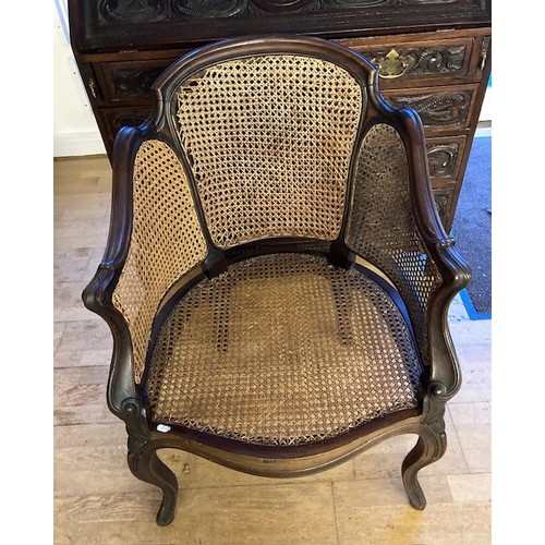 365 - An Edwardian Mahogany and cane bergère chair, standing on out swept  cabriole legs, H88, W64cm