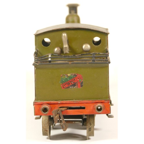 19 - Bing for Bassett Lowke, a clockwork tin plate gauge 1 L.S.W.R 109 locomotive, with brown edged green... 