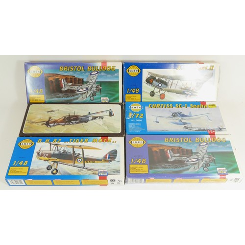 83 - Smér, four vintage plastic 1:48 kits of aviation models, 0806, two 0812, 0811, together with two 1:7... 