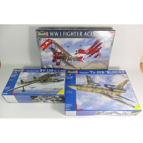 108 - Revell, a plastic 1:28 'WW1 Fighter Aces' model kit, 05771, together with two 1:72 kits, 04368 and 0... 