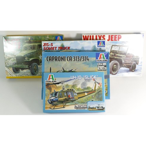 149 - Italeri, two plastic 1:35 kits of military models, 271, 297, a 1:24 Willys Jeep kit, 721, and two 1:... 