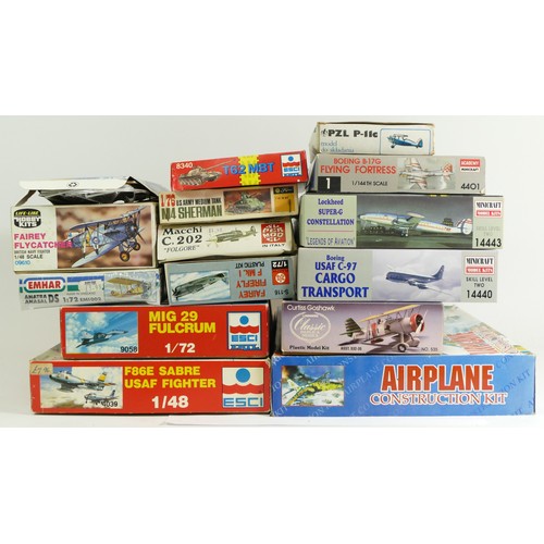 156 - A group of model kits to include a ESCI 1:48 F86E Sabre, 4039, and other branded examples.