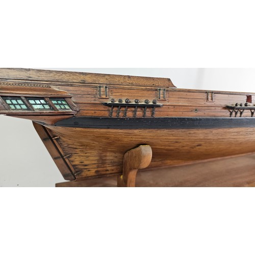 176 - A plank on frame part built model of a Brigantine, together with plans, books, accessories and riggi... 