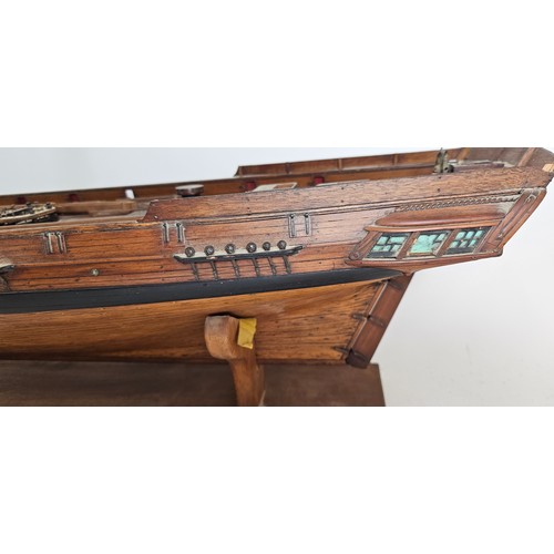 176 - A plank on frame part built model of a Brigantine, together with plans, books, accessories and riggi... 