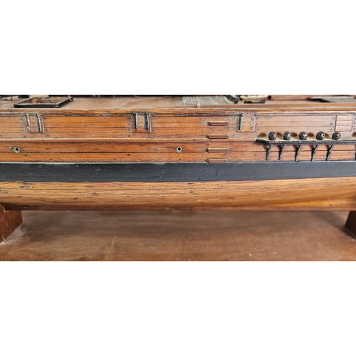 176 - A plank on frame part built model of a Brigantine, together with plans, books, accessories and riggi... 