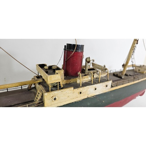 177 - A scratch built wooden model of the Wilson Shipping Line SS Erato, with rigging and spars, mounted o... 