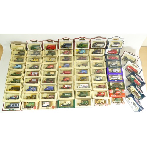 179 - LLedo, a large collection of approximately 70 diecast vehicles to include Walkers Crisps, Coca-Cola,... 