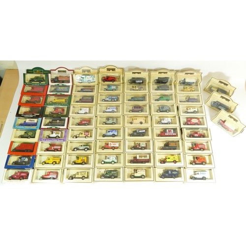 180 - LLedo, a large collection of approximately 70 diecast vehicles to include The Post Office, Kaffee Ha... 