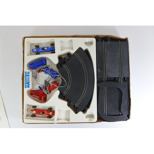 192 - Two boxed Scalextric model car racing sets; Set 31 and Model G.P.1 together with a boxed Scalextric ... 