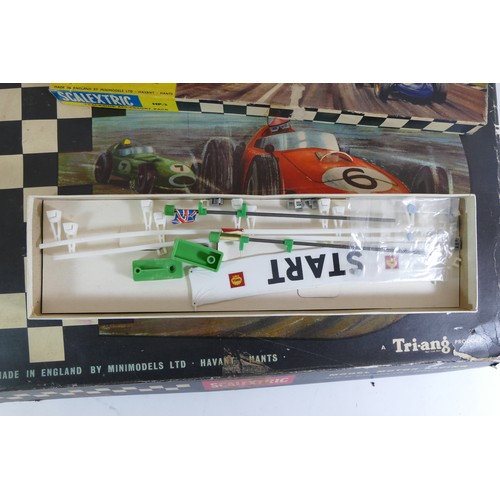 192 - Two boxed Scalextric model car racing sets; Set 31 and Model G.P.1 together with a boxed Scalextric ... 