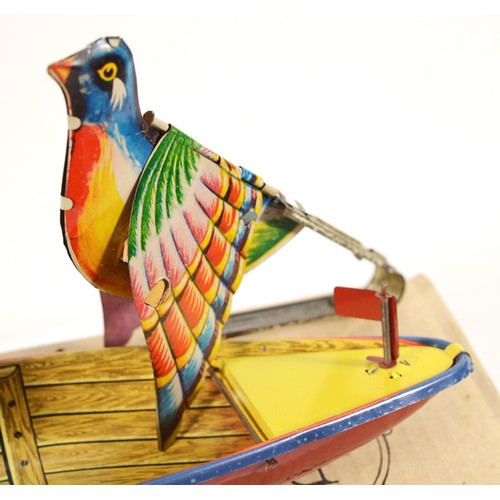 195 - A reproduction Jaya Spanish tin plate model toy in the form of a man rowing, boxed.