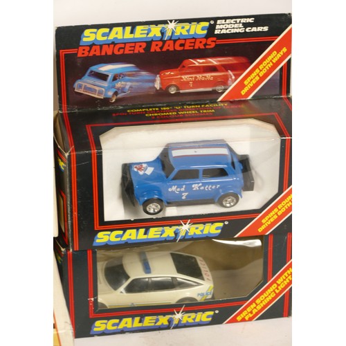 197 - Scalextric, A C450 sound track box, a C452 Think tank box, and boxed cars, C.290 Mini Ha-Ha, C.287 F... 