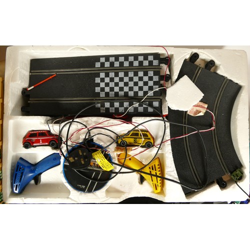 199 - Scalextrix, an unboxed vintage 31 set, track and cars, with another unboxed Mini racing example.