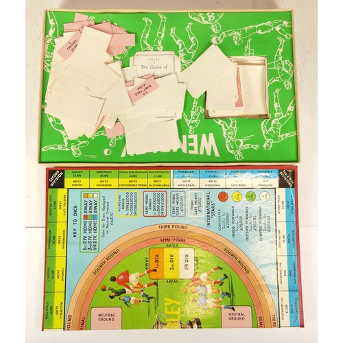 201 - A vintage boxed 'Super Striker' tabletop five-a-side football game, with a 'Wembley' football board ... 