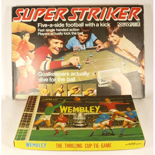 A vintage boxed 'Super Striker' tabletop five-a-side football game 