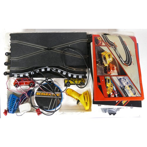 202 - Vintage electric racing games comprising, two Scalextric sets, 300, 400, Novo GT Racing, Tomy AFX Fo... 