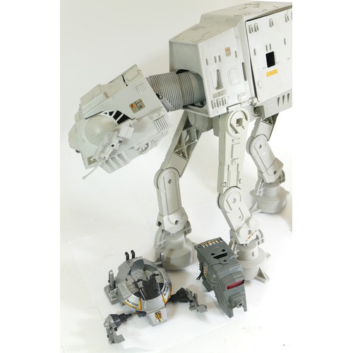 212 - A boxed electronic and articulated Star Wars AtAt from the Return of the Jedi, box damaged.